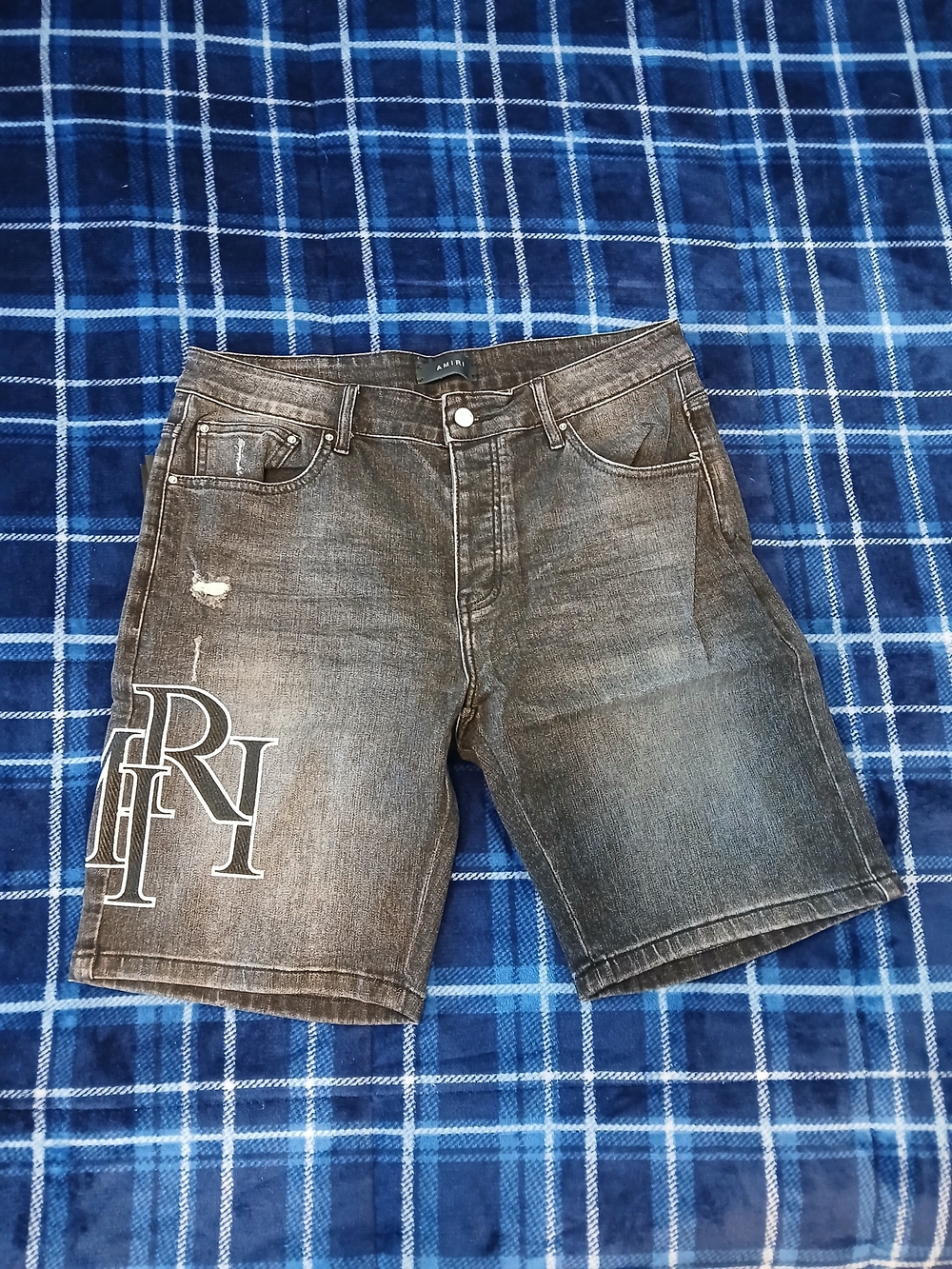 AMIRI Black Washed Distressed Denim Shorts with White Logo